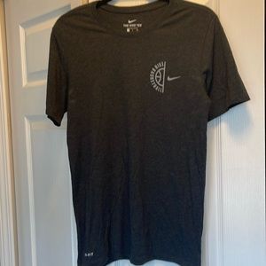 Nike NWOT men’s gray short sleeve shirt.